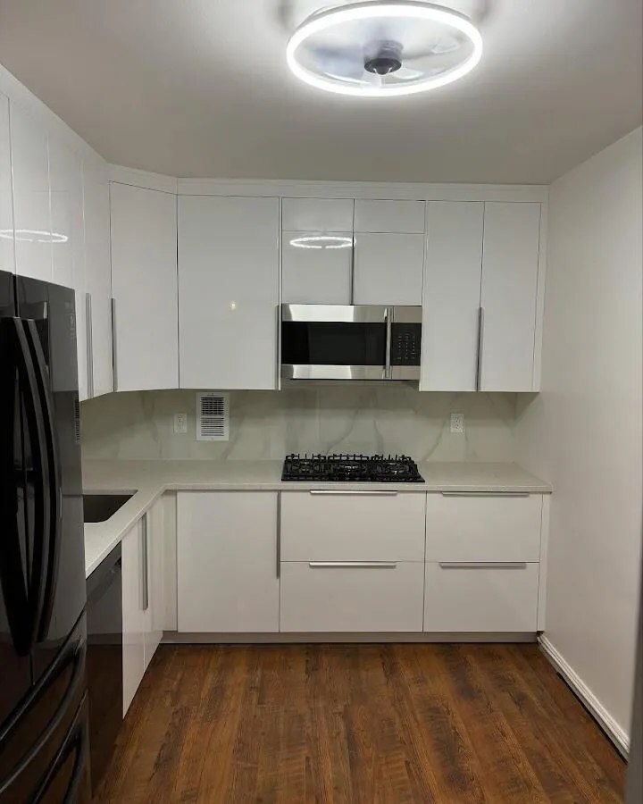 Renovated kitchen with quartz countertops in Reminderville